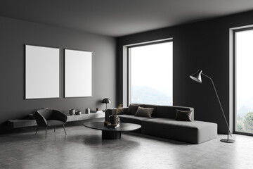 Dark living room interior with two empty white posters