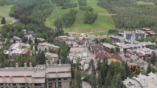 Vail city center and surrounding mountains, Colorado. Aerial view from drone in summer season