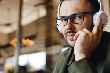 Obraz premium handsome man with headphones indoor
