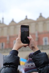 person taking picture of themselves with phone