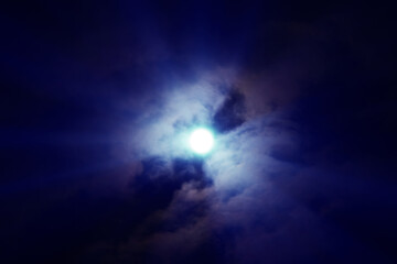 Fototapeta na wymiar full moon light ray clouds