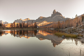 An alpine lake among the dolomites with reflection