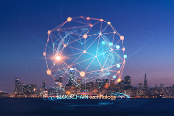 Skyline of San Francisco Panorama at Illuminated night time from Treasure Island, California, United States. Decentralized economy. Blockchain, cryptography and cryptocurrency concept, hologram