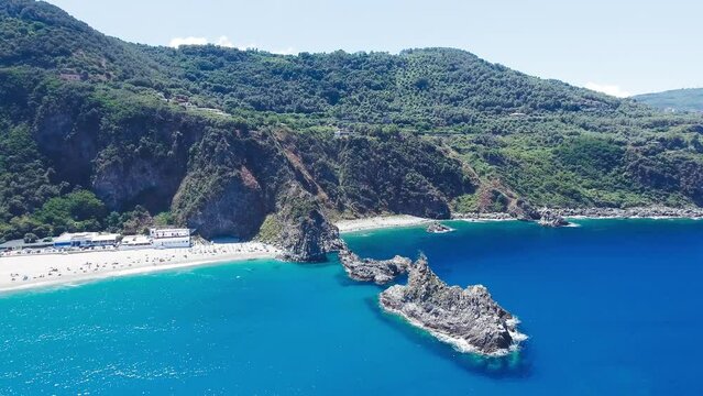 Aerial view of rock of the ulivarella, Tonnara di Palmi, Calabria, Italy. Slow motion