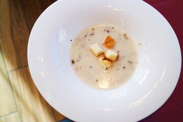 french soup in white bowl
