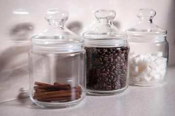 Coffee sugar and cinnamon in glass jars