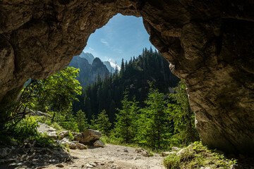 View from the Oblaskowa cave through on the Koscieliska valley. Polish Western Tatras, Lesser Poland - obrazy, fototapety, plakaty