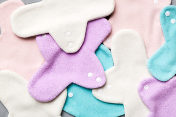 Eco-friendly reusable fabric women's pads. set of colorful bright reusable menstrual pads. zero waste woman periods concept top view with copy space