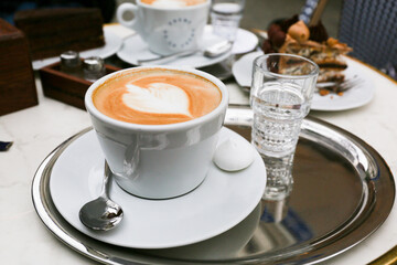 cup of cappuccino in a cafe