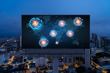 Hologram of Earth planet map on billboard over night panoramic cityscape of Kuala Lumpur, Malaysia, Asia. The concept of international companies in KL. Globe