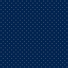 Blue and white seamless dot pattern. Dark blue background. Abstract pattern with dot texture. Vector polka dots background.