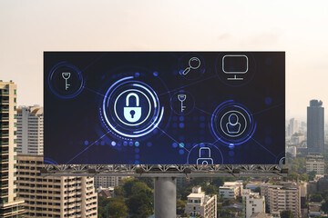 Padlock icon hologram on road billboard over panorama city view of Bangkok at day time to protect business, Southeast Asia. The concept of information security shields.