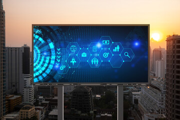 Hologram of Research and Development glowing icons on billboard. Sunset panoramic city view of Bangkok. Concept of innovative technologies to create new services and products in Southeast Asia.