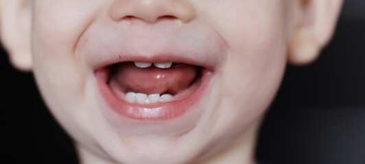 cheerful emotional portrait of a baby smile