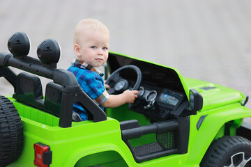 child driver electric car attraction SUV small