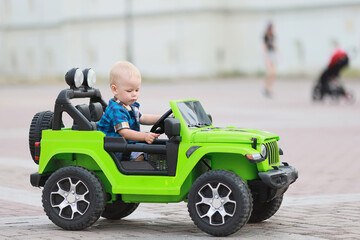 child driver electric car attraction SUV small