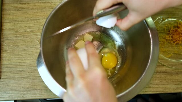 butter eggs in bowl overhead view