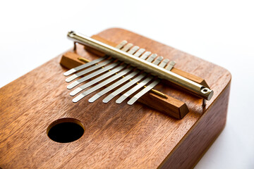 Traditional wooden kalimba isolated on white