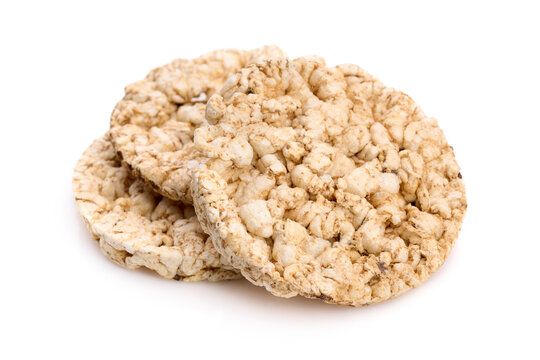 Puffed rice bread isolated on white background. Rice cakes. Round diet crispbreads on a white background. Round shaped cereal bread, healthy food without yeast. 