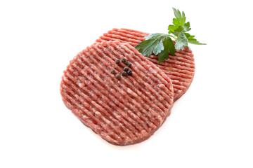 raw ground beef isolated on a white background with peppercorns