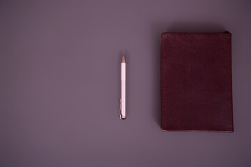 Items on the table. Studying and working with a laptop and a notebook. Early morning and coffee.