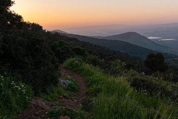 Sunset view of the Harod and Jezreel Valleys from Mount Gilboa in Israel
