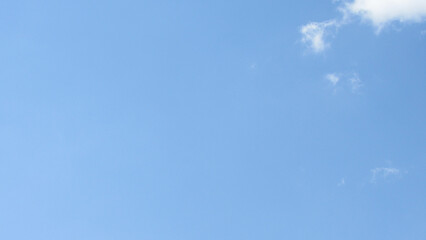 Naklejka na ściany i meble blue sky and white clouds. clouds against blue sky background. warm weather. spring has come