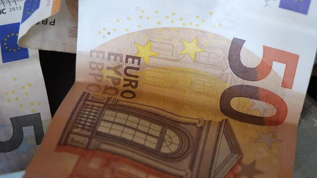 A 50 euro banknote, a close-up video. Highly detailed image of paper money. The currency of the European Union.