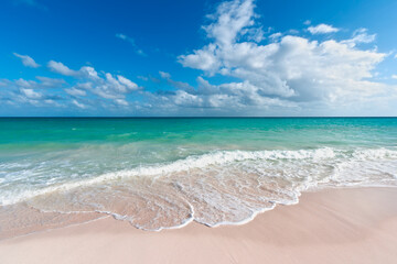 Fototapeta na wymiar Beautiful beach and waves of Caribbean Sea