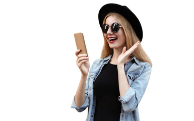 Portrait of surprised young woman with phone on city street wearing a black round hat isolated on white background