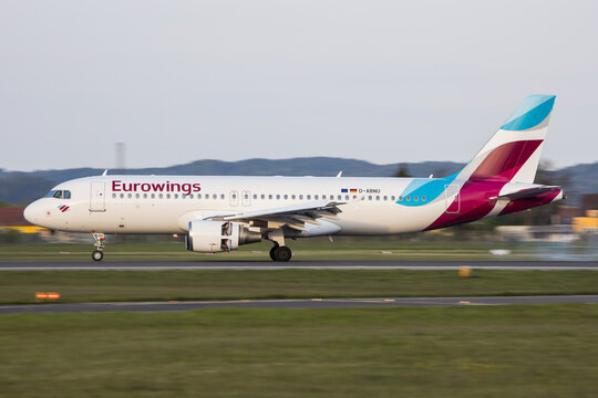 An Airbus A320 of german airline Eurowings arriving in Graz in Austria coming from Stuttgart