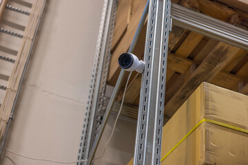 Technology view of safety camera in warehouse. Security concept. Sweden. 