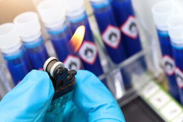flammable chemicals in test tubes and symbol