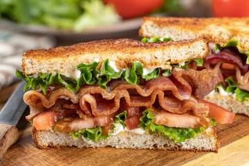 Bacon, lettuce and tomato sandwich cut in half