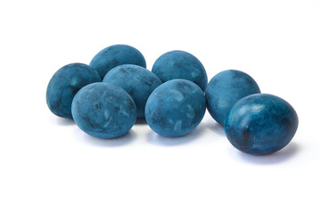 Group of blue painted eggs on a white background