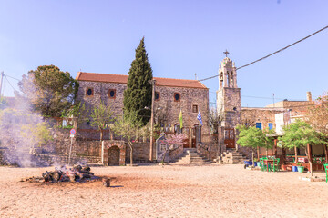 Square with its church at Avgonima village in Chios, Greece
