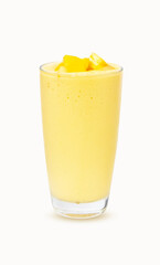 Fresh Mango ripe organic yellow smoothie honey mix in glass. Perfect for summer drink. Healthy food. There is vitamin C. Garnish isolated on white background. Ripe mangoes are popular all over world. 