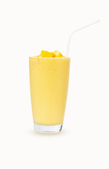 Fresh Mango ripe organic yellow smoothie honey mix in glass with straw. There is vitamin C. Garnish. Ripe mangoes are popular all over world. Perfect for summer drink. isolated on white background.