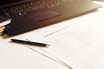 business documents with laptop, keyboard and pen. workplace businessman