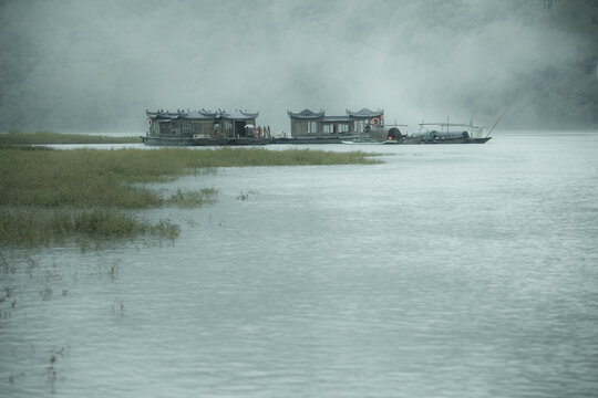 Zhejiang lishui lotus scenic areas and white sailing boats 