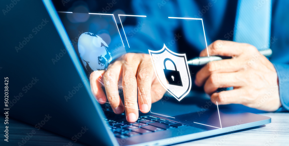 Poster businessman using laptop computer on the table with information security privacy icon