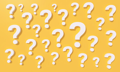 Many Questions mark on yellow studio background.