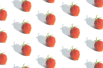 Pattern with strawberries isolated on white. Abstract summer background