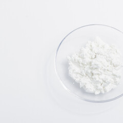 cottage cheese in a glass transparent bowl isolated on a white background