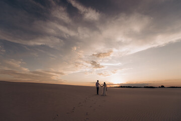 couple walking on the beach