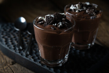 Homemade chocolate pudding with crumbled cookies