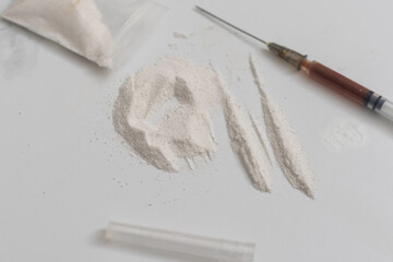 Syringes, drugs, heroin, and cooked.