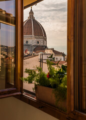 view of the cathedral in Florence, Italy from a window 