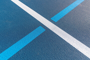 Fototapeta na wymiar Blue tennis courts with white lines and light blue pickleball lines