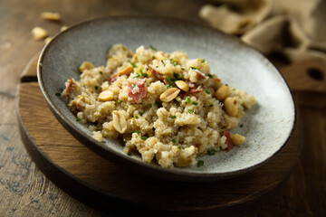 Quinoa with smoked ham and peanut